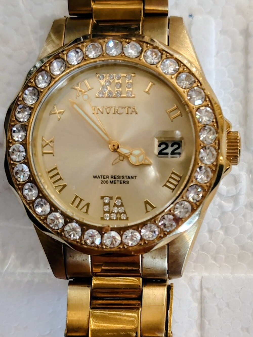 Invicta Women’s Gold Crystal Bezel Bracelet Watch